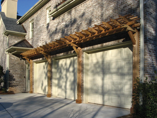 This is an example of a traditional attached three-car garage in Atlanta.