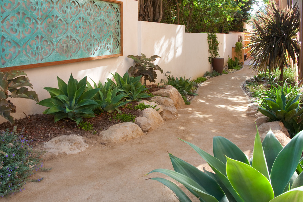 Photo of a large mediterranean backyard garden in Santa Barbara.