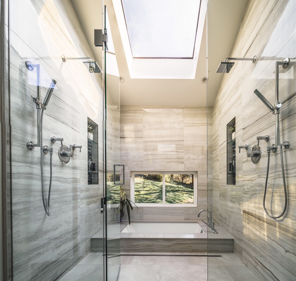 Large contemporary master bathroom in San Francisco with engineered quartz benchtops, an undermount tub, a curbless shower and porcelain floors.