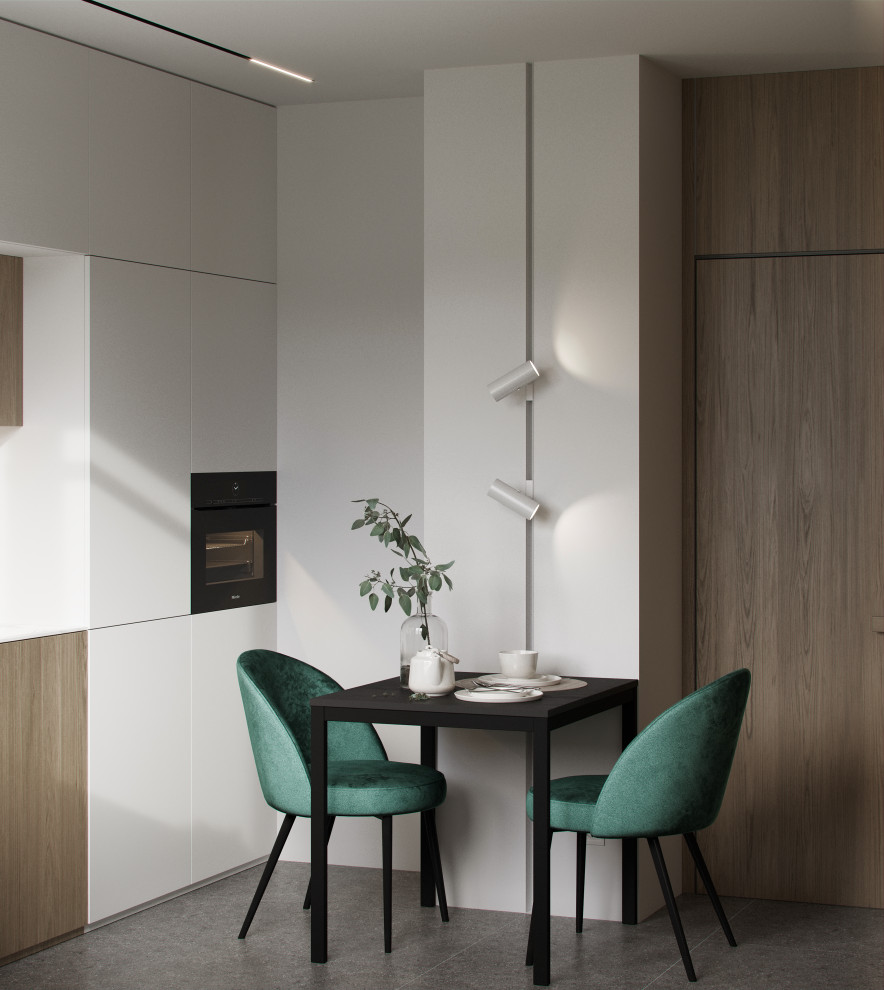 Esempio di una piccola cucina a L minimalista chiusa con lavello integrato, ante lisce, ante in legno scuro, top in marmo, pavimento in gres porcellanato, pavimento grigio e top bianco