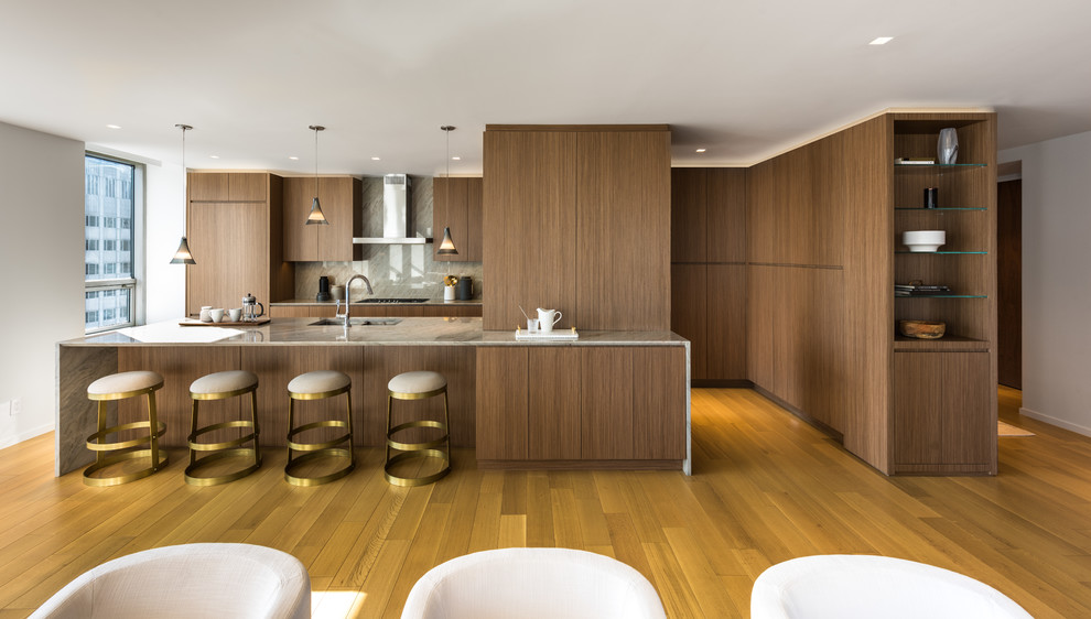 Design ideas for a large contemporary l-shaped kitchen pantry in New York with a double-bowl sink, flat-panel cabinets, medium wood cabinets, quartzite benchtops, multi-coloured splashback, stone slab splashback, panelled appliances, light hardwood floors, with island and multi-coloured benchtop.