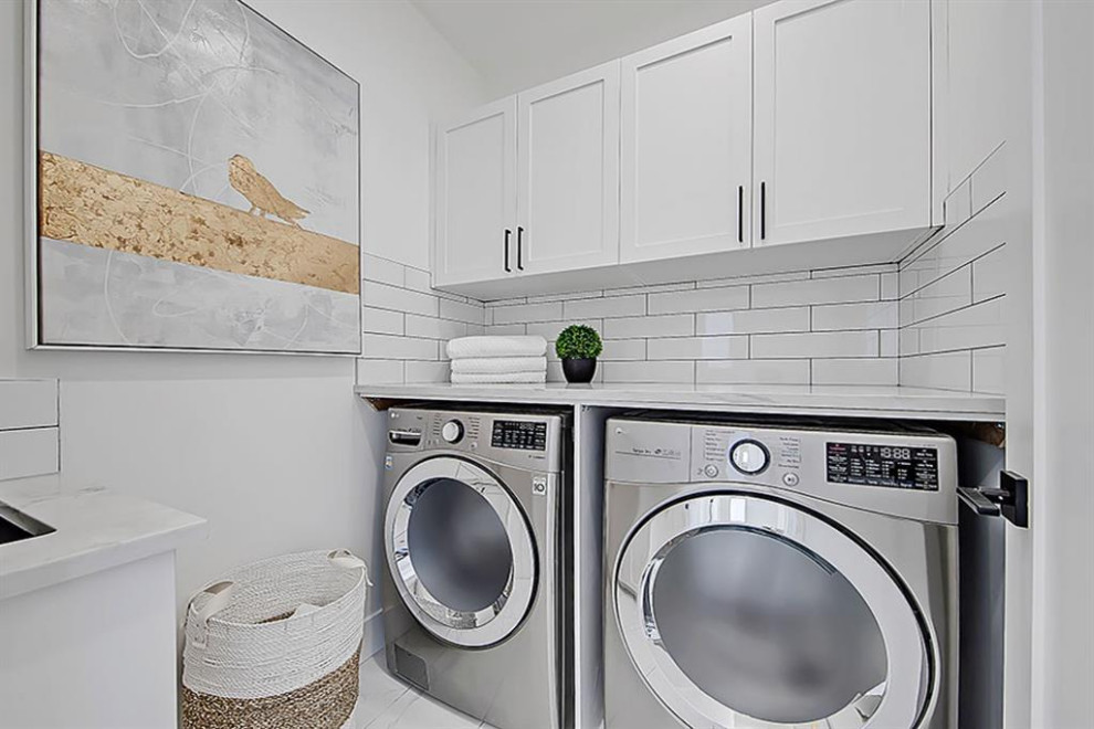 Transitional home design photo in Calgary