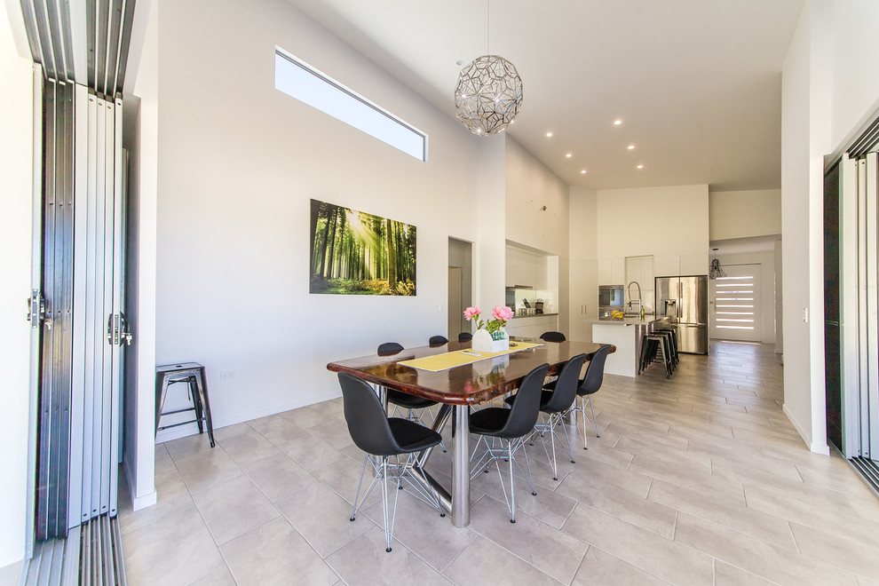 Photo of a modern dining room in Brisbane.