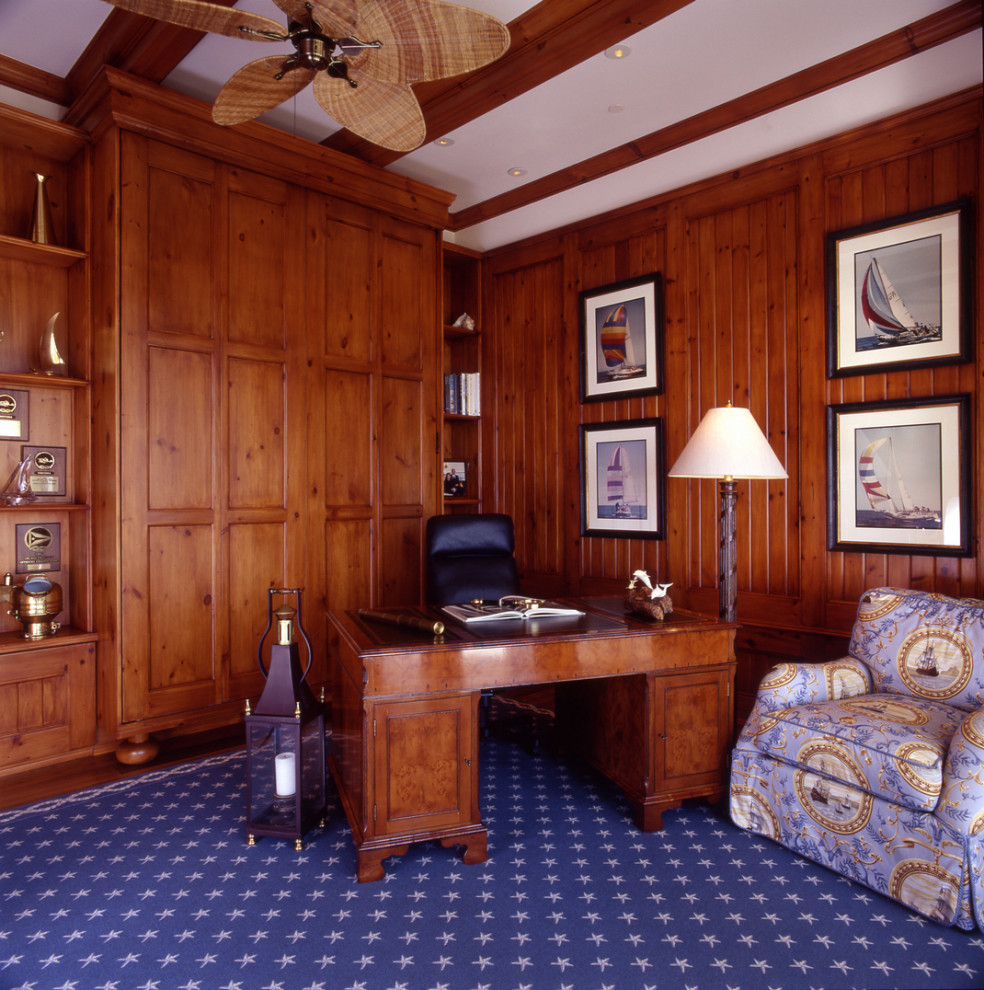 Photo of a beach style study room in Miami with brown walls, medium hardwood floors, no fireplace, a freestanding desk, brown floor, coffered, exposed beam, panelled walls and wood walls.