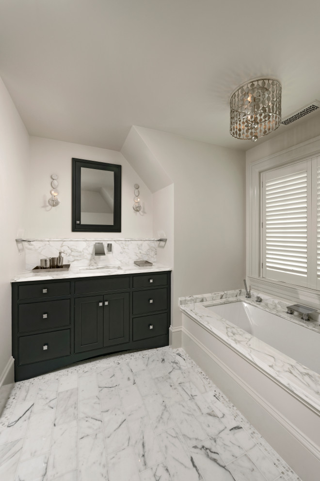 Design ideas for a large transitional 3/4 bathroom in DC Metro with shaker cabinets, black cabinets, an undermount tub, gray tile, marble, grey walls, ceramic floors, an undermount sink, marble benchtops, white floor, multi-coloured benchtops, a single vanity and a built-in vanity.