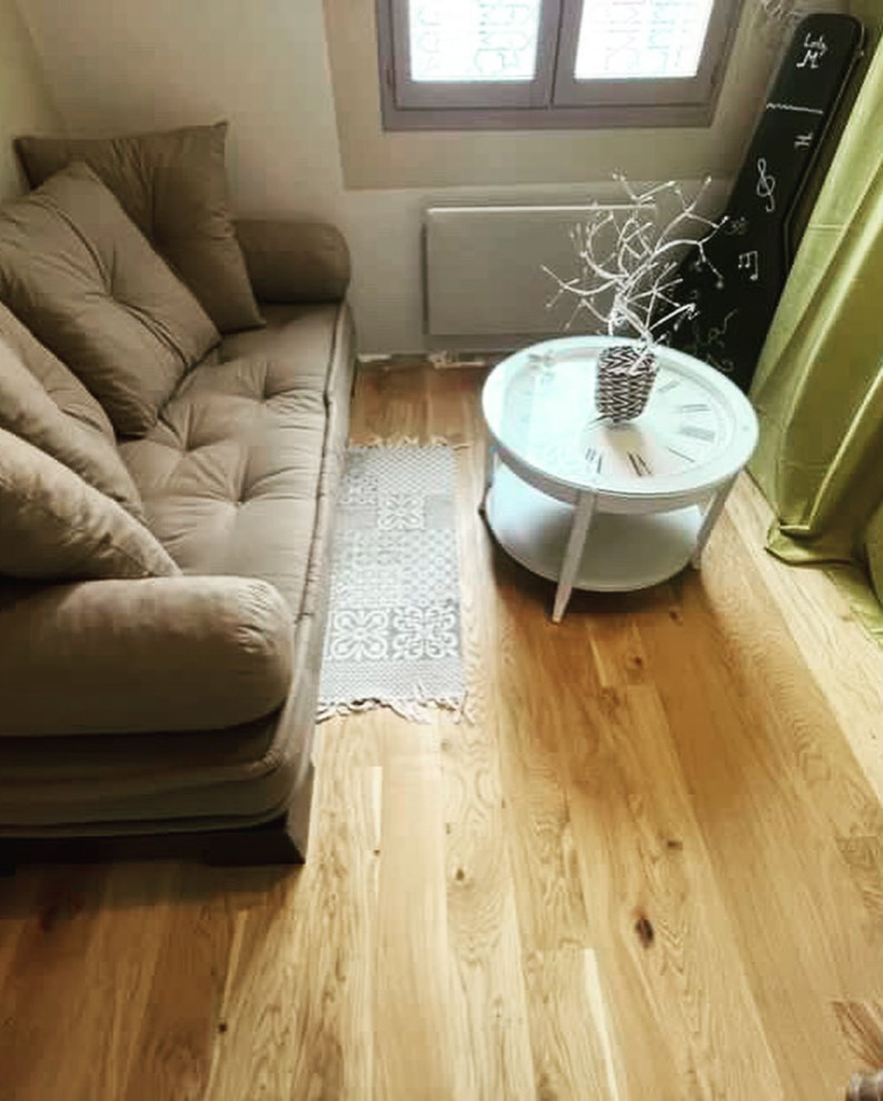 Dépose d’un ancien parquet flottant et pose d’un nouveau parquet collé en chêne.