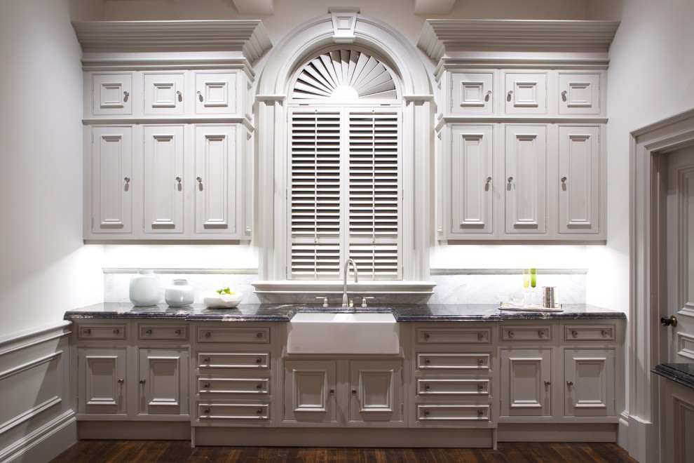 Inspiration for a large classic l-shaped kitchen/diner in Glasgow with a belfast sink, recessed-panel cabinets, grey cabinets, marble worktops, white splashback, marble splashback, stainless steel appliances, dark hardwood flooring, an island, brown floors and multicoloured worktops.