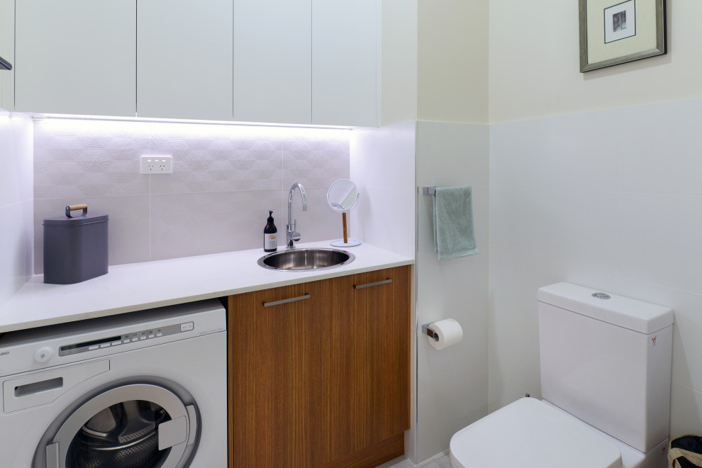 Design ideas for a traditional laundry room in Sydney.