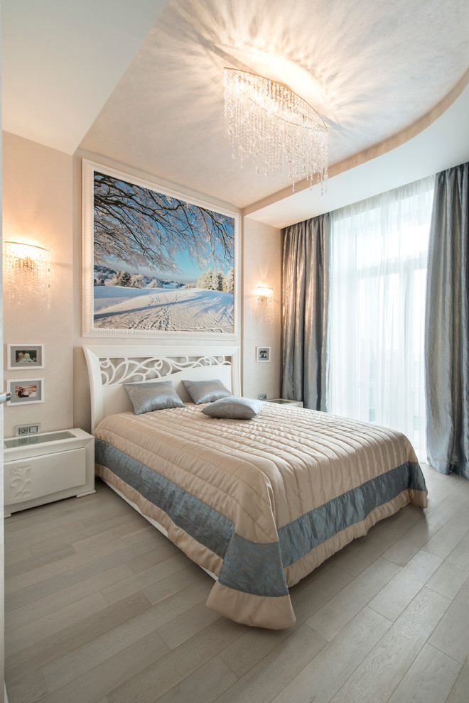 Contemporary master bedroom in Moscow with beige walls and light hardwood floors.