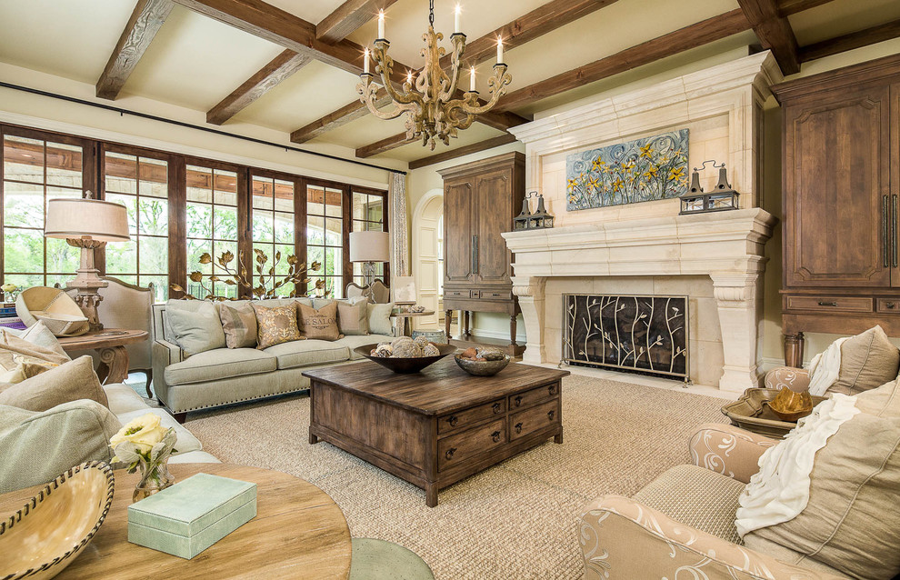 This is an example of a traditional living room in Dallas with beige walls and a standard fireplace.
