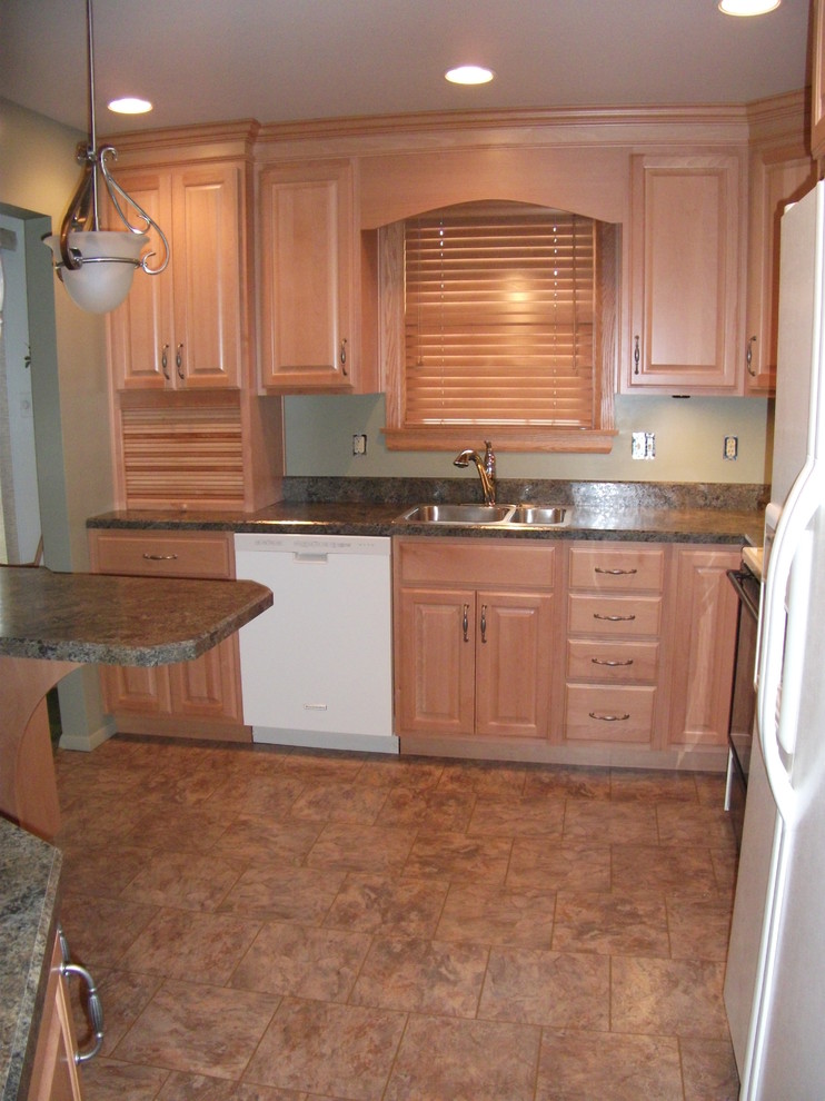 Elegant multicolored floor kitchen photo with white appliances