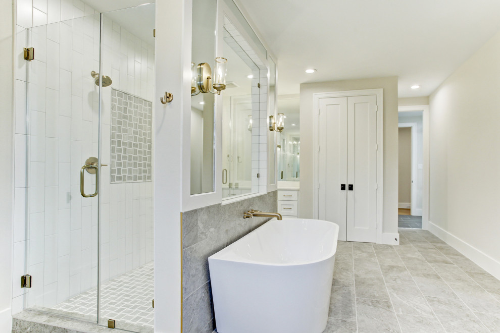 Inspiration for a large transitional master bathroom in Houston with shaker cabinets, white cabinets, a freestanding tub, a double shower, porcelain floors, an undermount sink, engineered quartz benchtops, a hinged shower door, white benchtops, a shower seat, a double vanity and a built-in vanity.