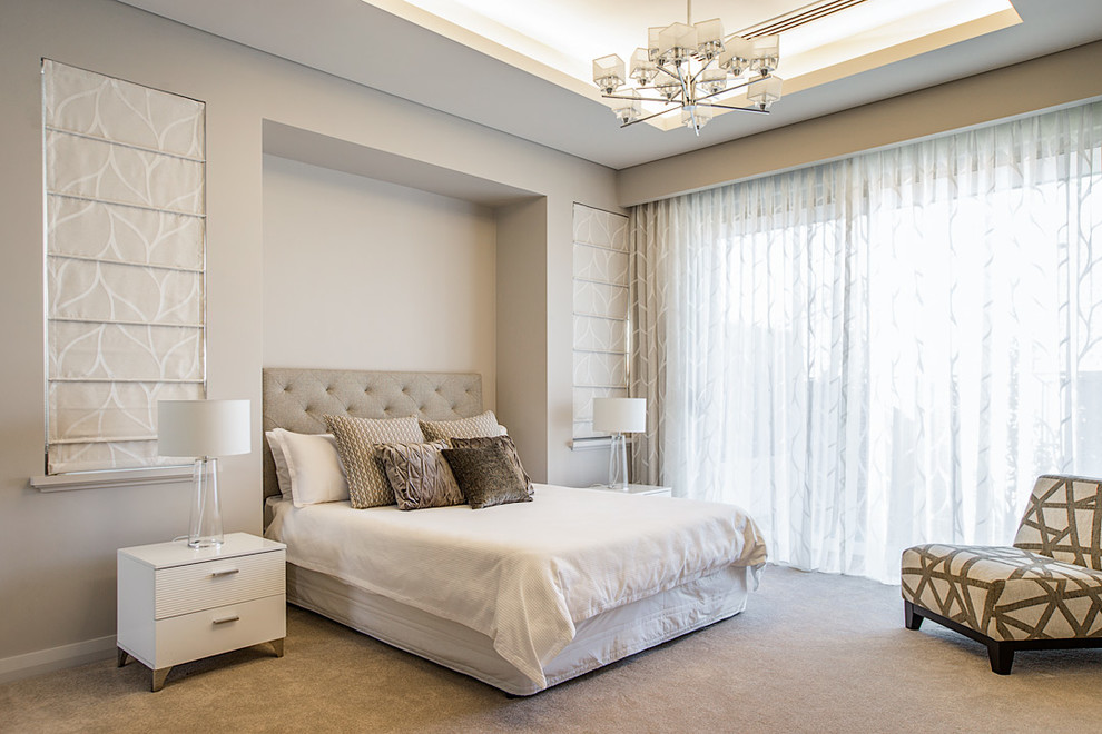 This is an example of a transitional bedroom in Perth with grey walls and carpet.