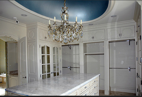 Inspiration for a large classic wardrobe in Dallas with beaded cabinets and white cabinets.