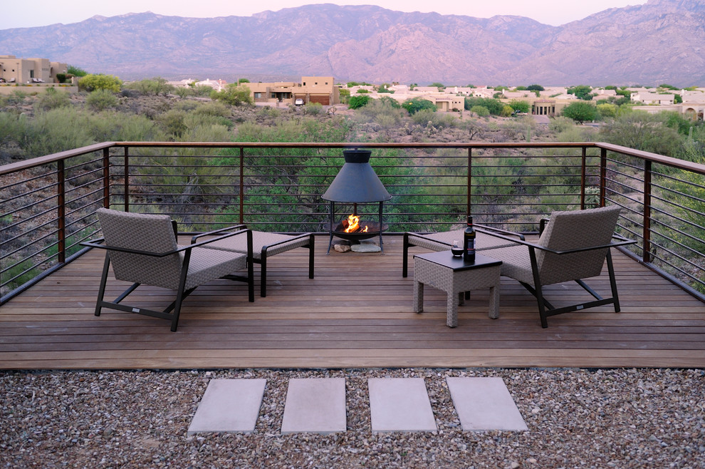 Contemporary deck in Phoenix with a fire feature.