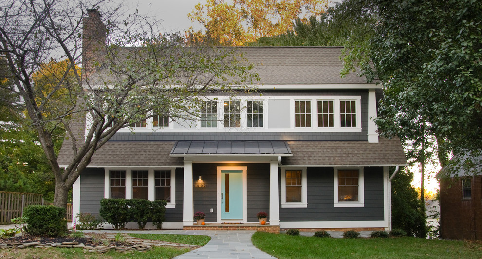 Inspiration for an arts and crafts two-storey grey house exterior in DC Metro with vinyl siding and a gable roof.