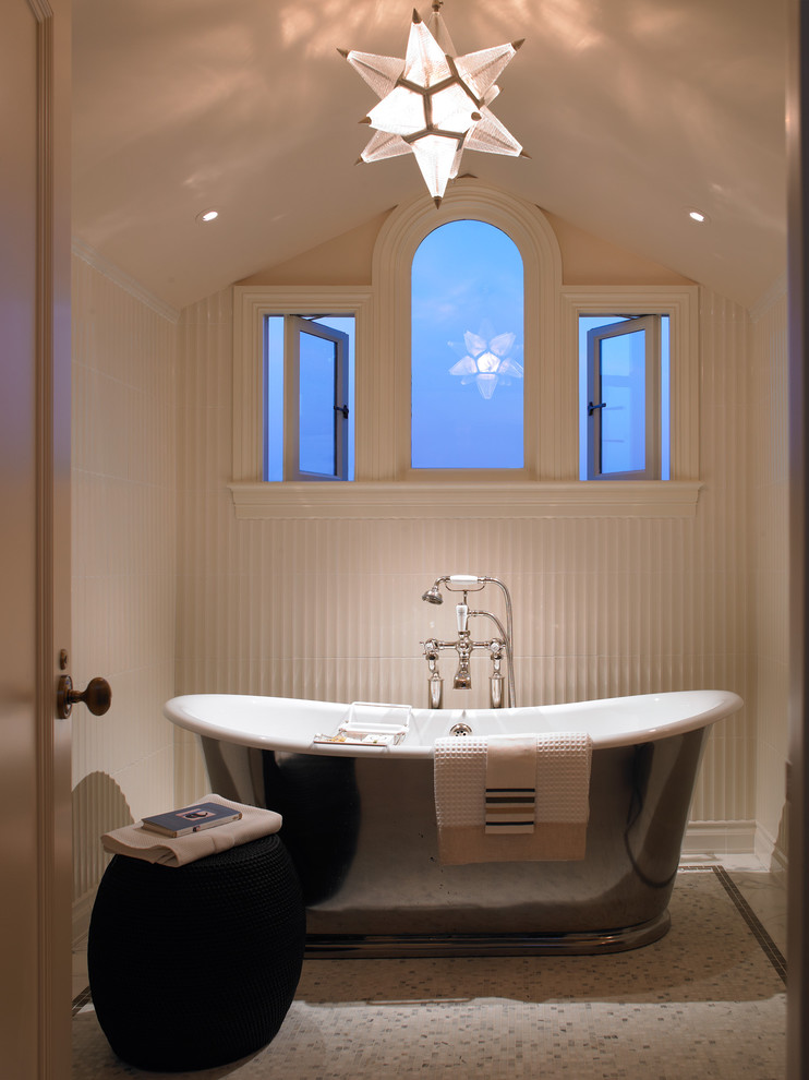 Inspiration for a traditional bathroom in San Francisco with a freestanding tub and mosaic tile.