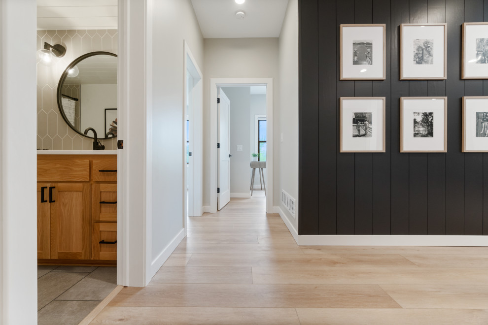 Kitchen/dining room combo - mid-sized modern vinyl floor, beige floor and shiplap wall kitchen/dining room combo idea in Minneapolis with gray walls