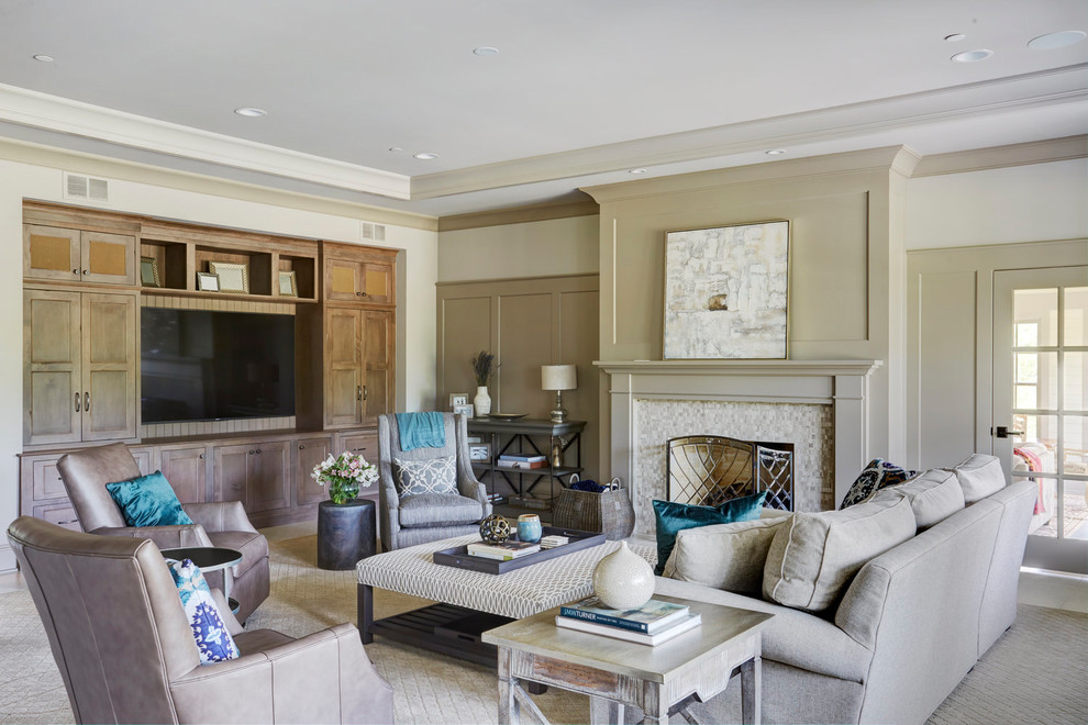 Photo of a transitional enclosed family room in Chicago with white walls, a standard fireplace, a tile fireplace surround and a built-in media wall.