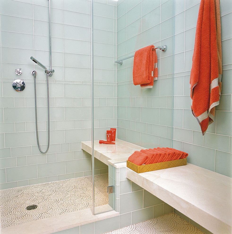 Photo of a contemporary bathroom in San Francisco with mosaic tile floors and glass tile.