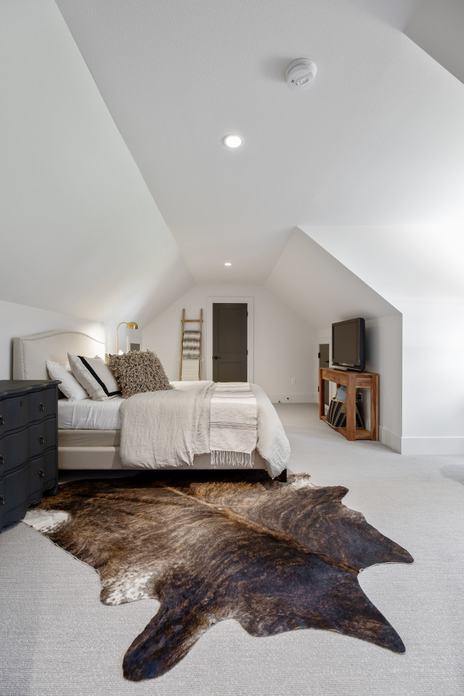 Mid-sized country loft-style bedroom in Portland with white walls, carpet, no fireplace, grey floor and vaulted.