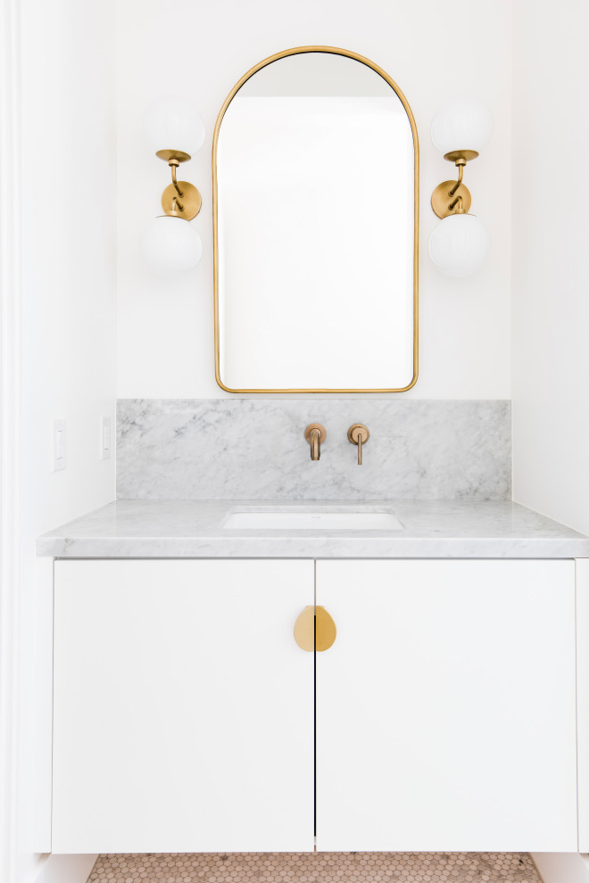 Contemporary powder room in Phoenix with flat-panel cabinets, white cabinets, white walls, mosaic tile floors, an undermount sink, marble benchtops, beige floor, grey benchtops and a floating vanity.