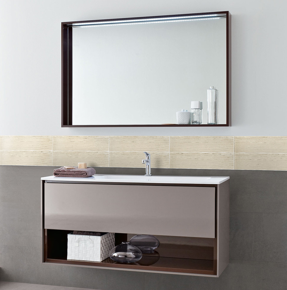 Photo of a large contemporary bathroom in San Francisco with a vessel sink, open cabinets, black cabinets, glass benchtops, beige tile, glass tile, beige walls and concrete floors.