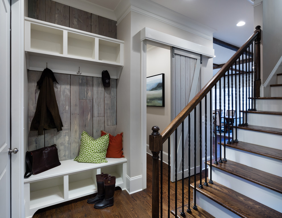 Inspiration for a mid-sized transitional entry hall in Atlanta with medium hardwood floors and brown floor.