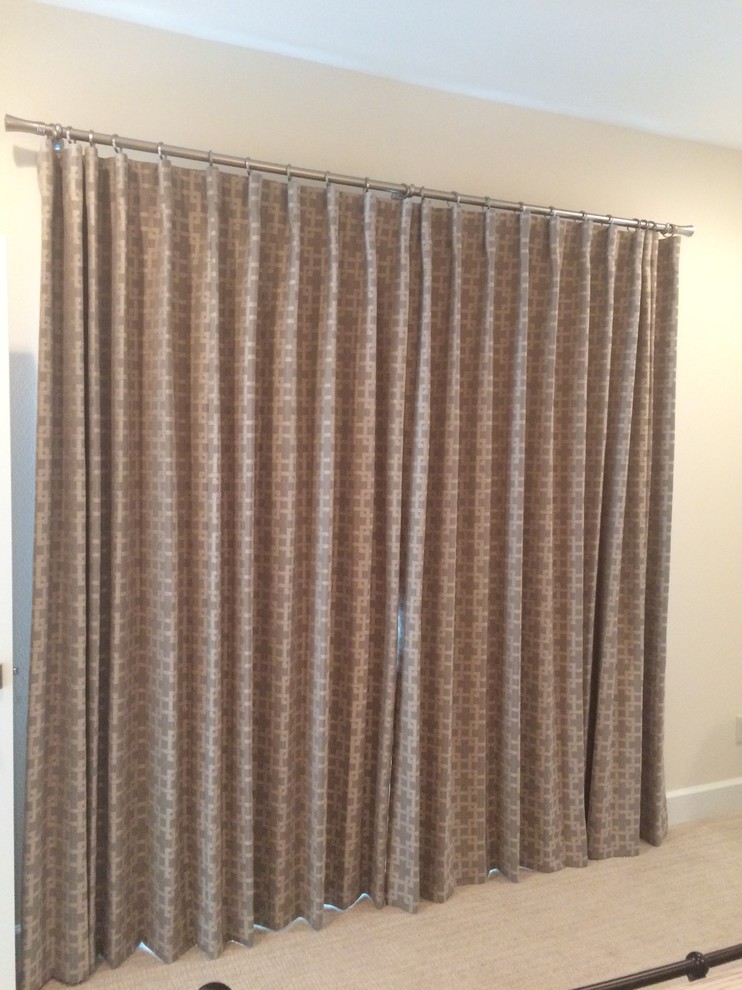 Mid-sized transitional guest carpeted home design photo with beige walls