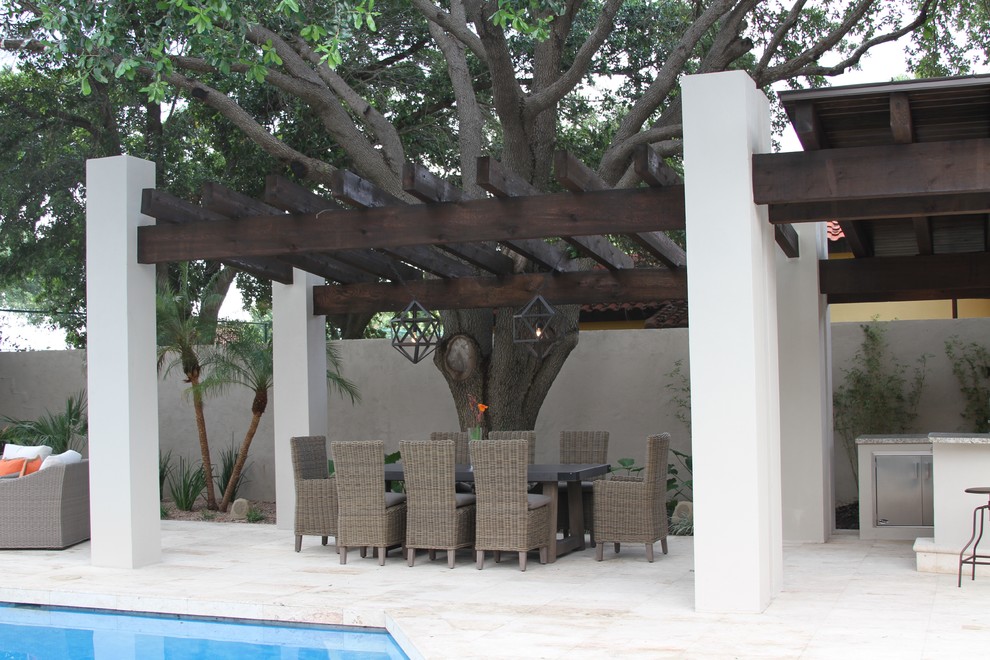 This is an example of a transitional patio in Austin.