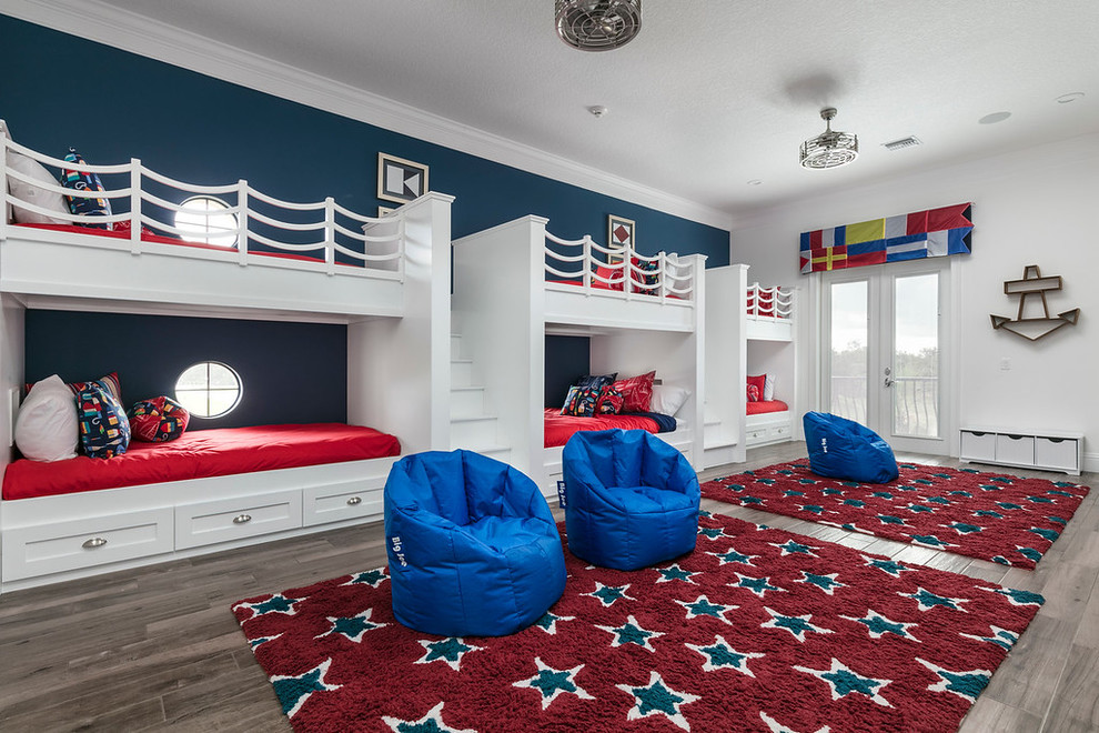 This is an example of a transitional gender-neutral kids' bedroom in Orlando with white walls, dark hardwood floors and brown floor.