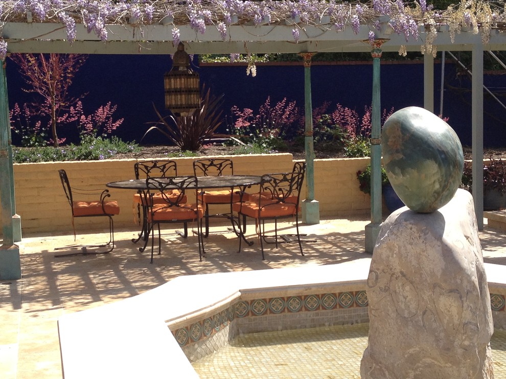 Example of a tuscan patio design in Santa Barbara