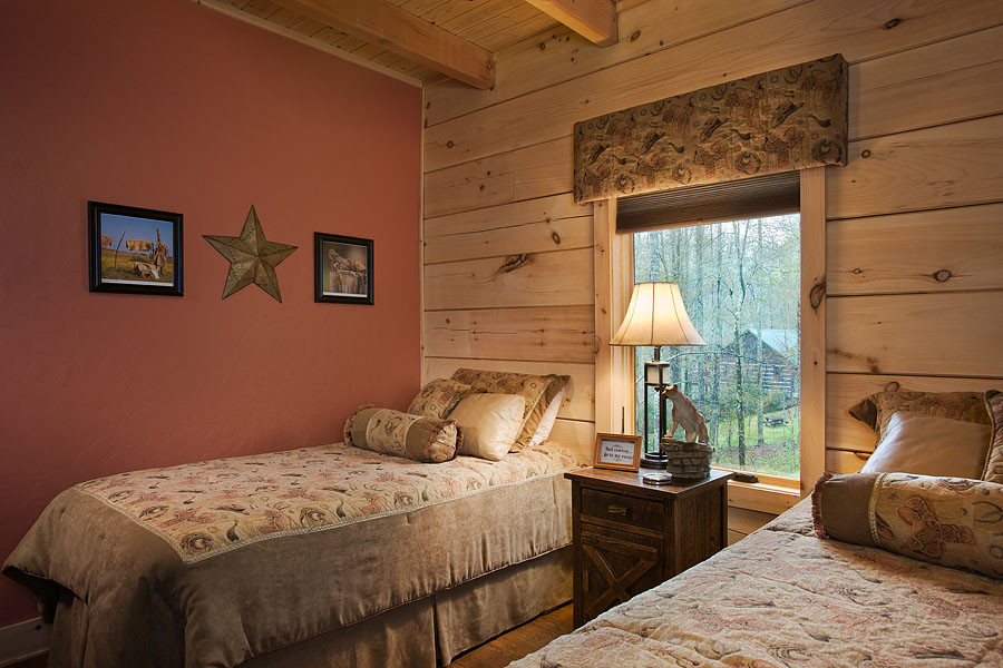 This is an example of a country bedroom in Charlotte.