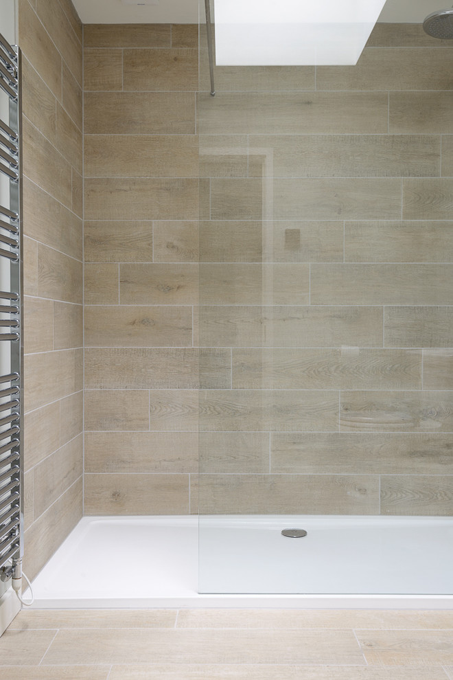 Mid-sized contemporary 3/4 bathroom in Other with an open shower, brown tile, porcelain tile, green walls and porcelain floors.