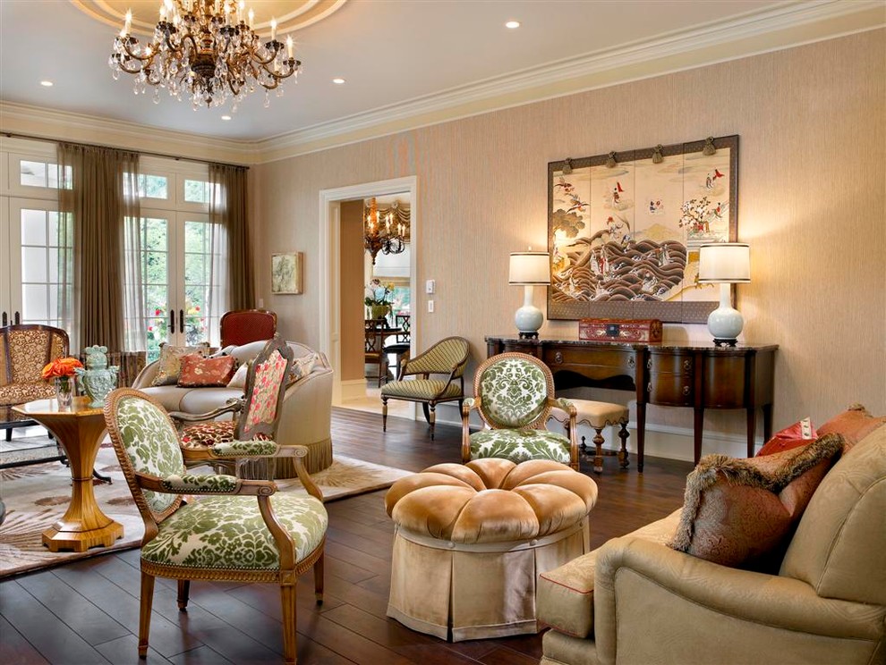 This is an example of a large traditional formal enclosed living room in Chicago with beige walls, dark hardwood floors, a standard fireplace and a stone fireplace surround.