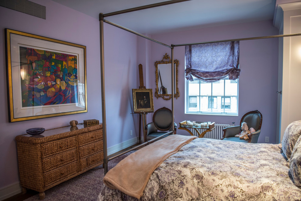 Mid-sized traditional guest bedroom in New York with purple walls, carpet, no fireplace and brown floor.