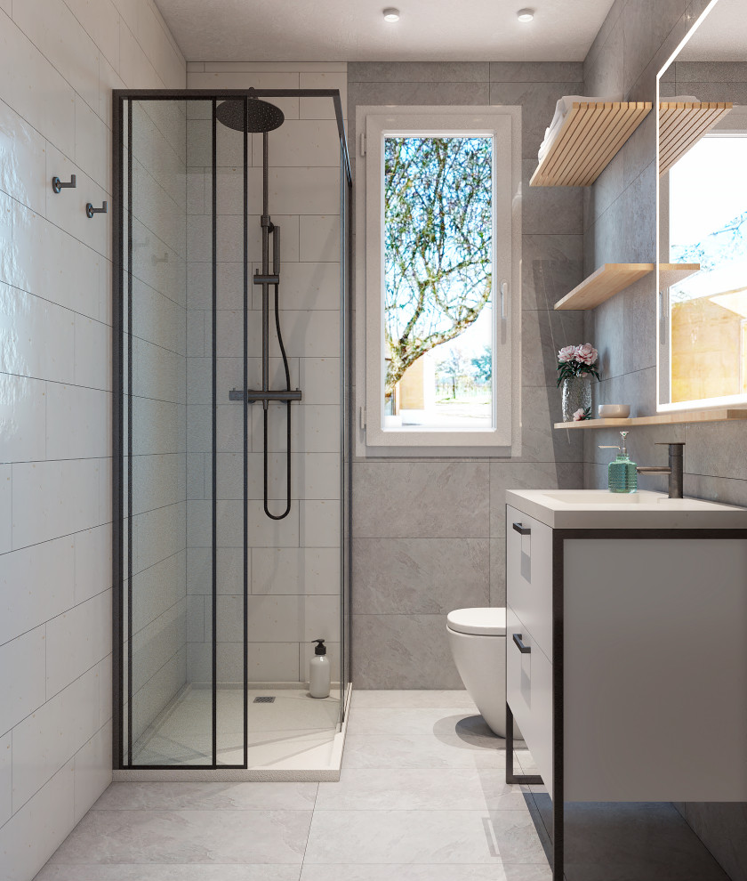 Exempel på ett litet modernt badrum med dusch, med grå skåp, en kantlös dusch, en vägghängd toalettstol, vit kakel, porslinskakel, grå väggar, grått golv och dusch med skjutdörr