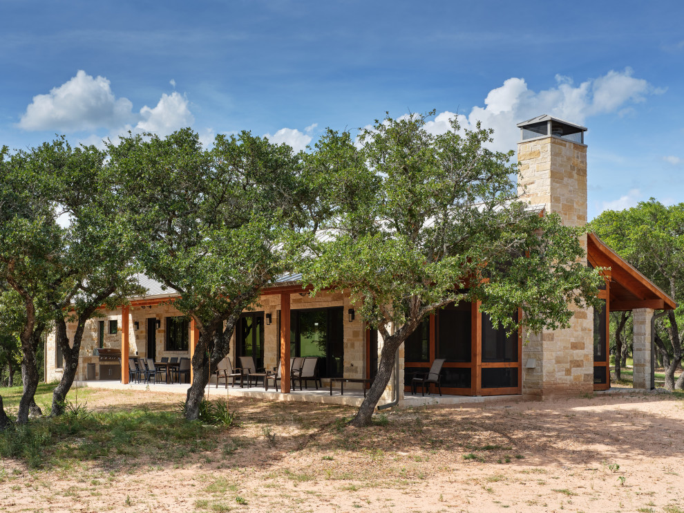 Inspiration for a large rural house exterior in Austin.