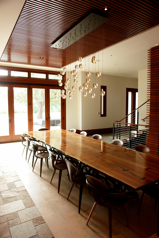 Modern dining room in Sacramento with beige walls.