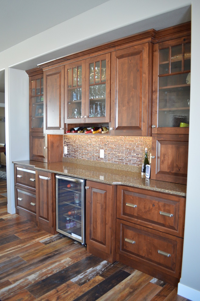 Example of a large mountain style home design design