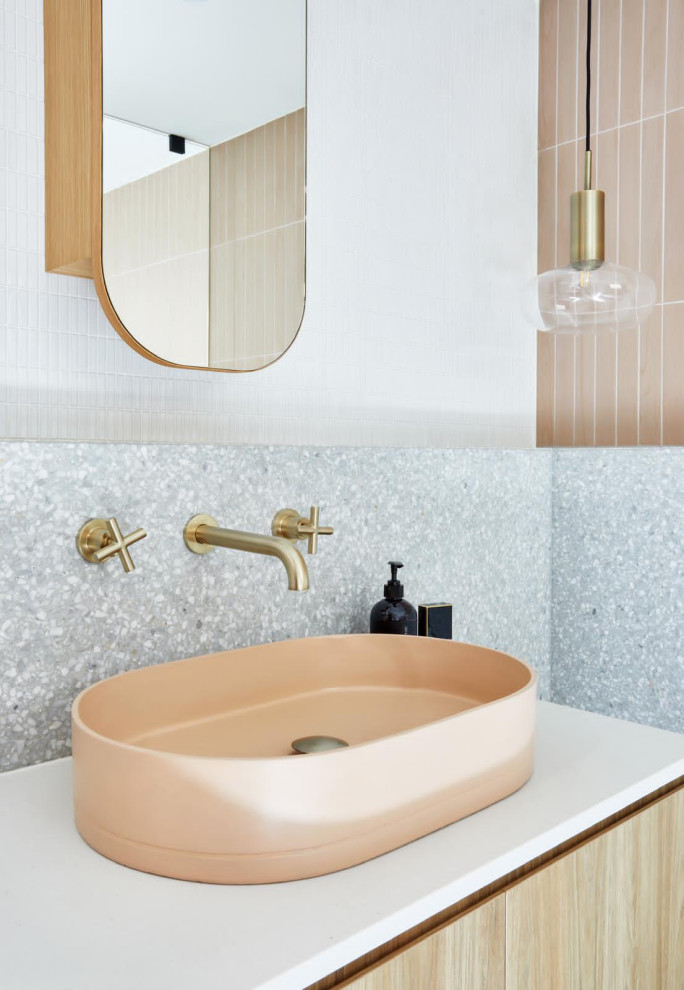 Inspiration for a mid-sized transitional master bathroom in Saint-Etienne with flat-panel cabinets, beige cabinets, a drop-in tub, a curbless shower, a wall-mount toilet, gray tile, mosaic tile, white walls, terrazzo floors, a vessel sink, terrazzo benchtops, grey floor, an open shower, grey benchtops, a single vanity and a floating vanity.
