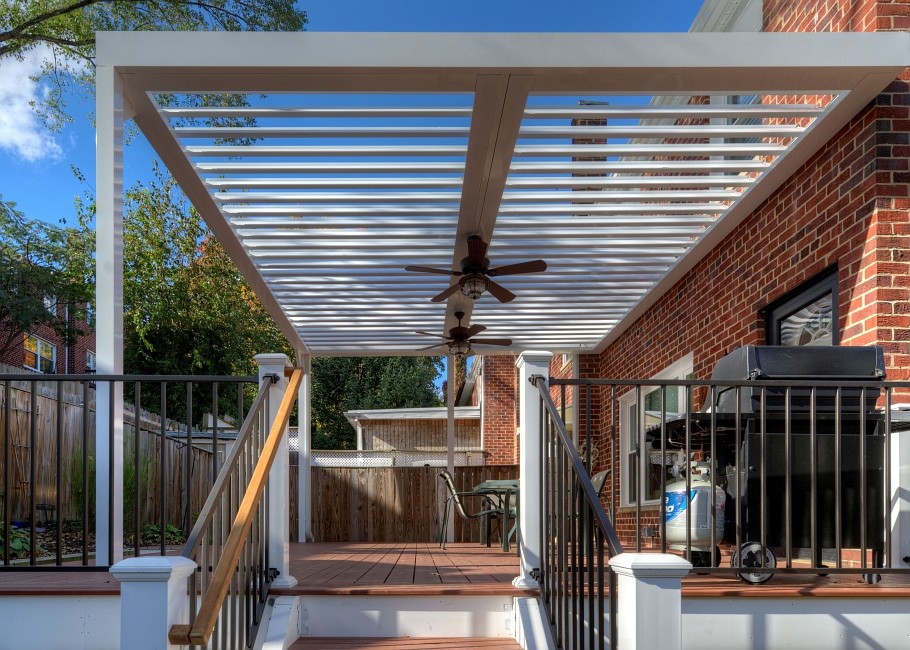 Inspiration for a large traditional backyard deck in DC Metro with a pergola.