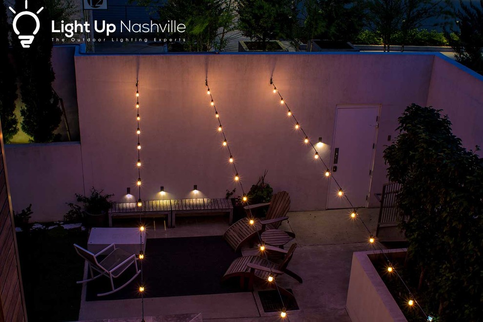 Outdoor kitchen deck - large transitional outdoor kitchen deck idea in Nashville