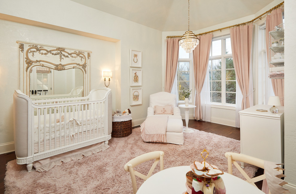 Design ideas for a mediterranean nursery for girls in Grand Rapids with a vaulted ceiling.