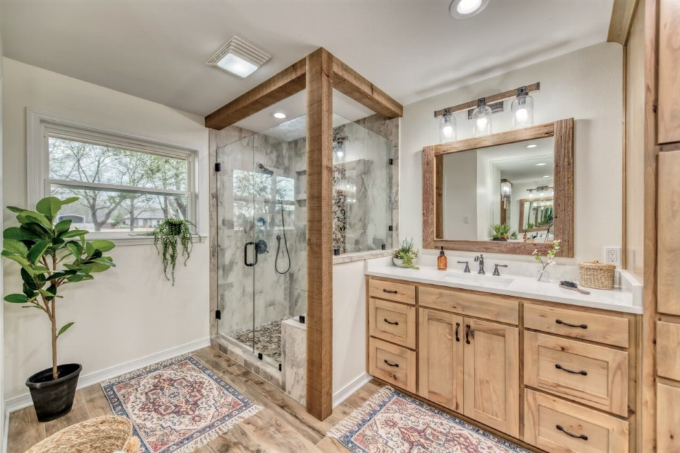 Example of a mid-sized mountain style master gray tile and stone tile wood-look tile floor, brown floor and double-sink bathroom design in Other with a two-piece toilet, white walls, an undermount sink, quartz countertops, a hinged shower door, white countertops and a built-in vanity