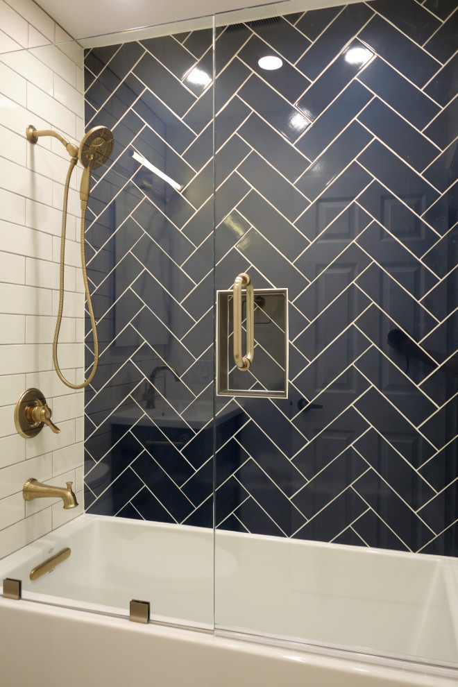 Example of a small 1950s 3/4 blue tile and ceramic tile porcelain tile, gray floor and single-sink bathroom design in San Francisco with recessed-panel cabinets, blue cabinets, a one-piece toilet, white walls, an integrated sink, solid surface countertops, a hinged shower door, white countertops and a freestanding vanity
