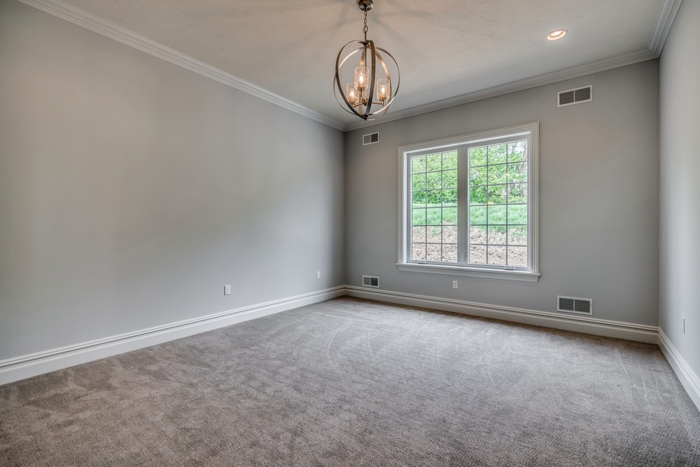 Inspiration for a large transitional master carpeted and gray floor home design remodel with gray walls