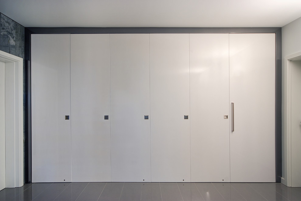 Photo of a contemporary storage and wardrobe in Adelaide.