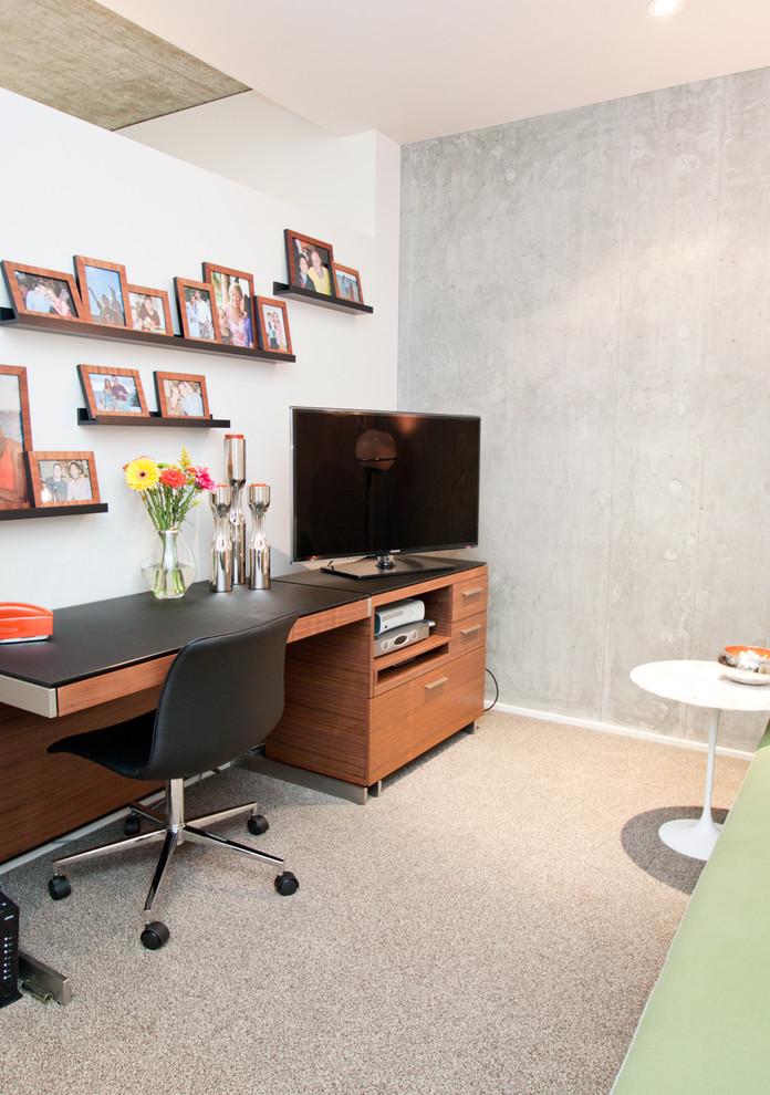 Photo of a large modern study room in Portland with grey walls, carpet, a freestanding desk and grey floor.