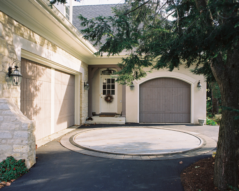 Photo of a traditional exterior in Columbus with stone veneer.
